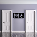 Accessible Toilet Sign | Inclusive Restroom Sign displayed on a modern restroom wall between two white doors.