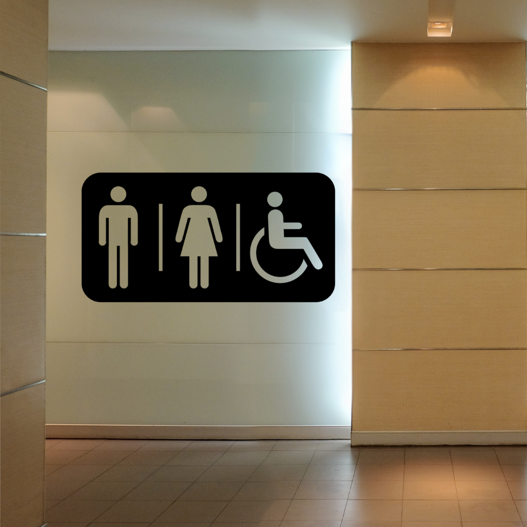 Accessible Toilet Sign |  Inclusive Restroom Sign mounted on a modern commercial restroom wall.