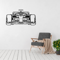 Apex Racer Formula One metal wall art displayed above a modern armchair in a minimalist living room.