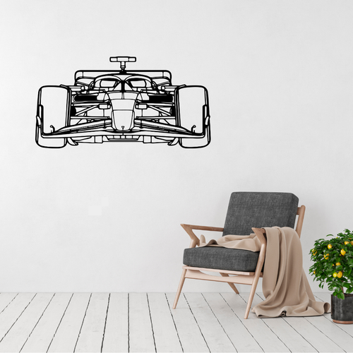 Apex Racer Formula One metal wall art displayed above a modern armchair in a minimalist living room.