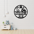 Farm animal metal wall art displayed in a rustic nursery room
