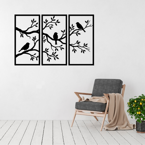 Birdsong Garden three panel birds and branches metal wall art displayed above a contemporary chair