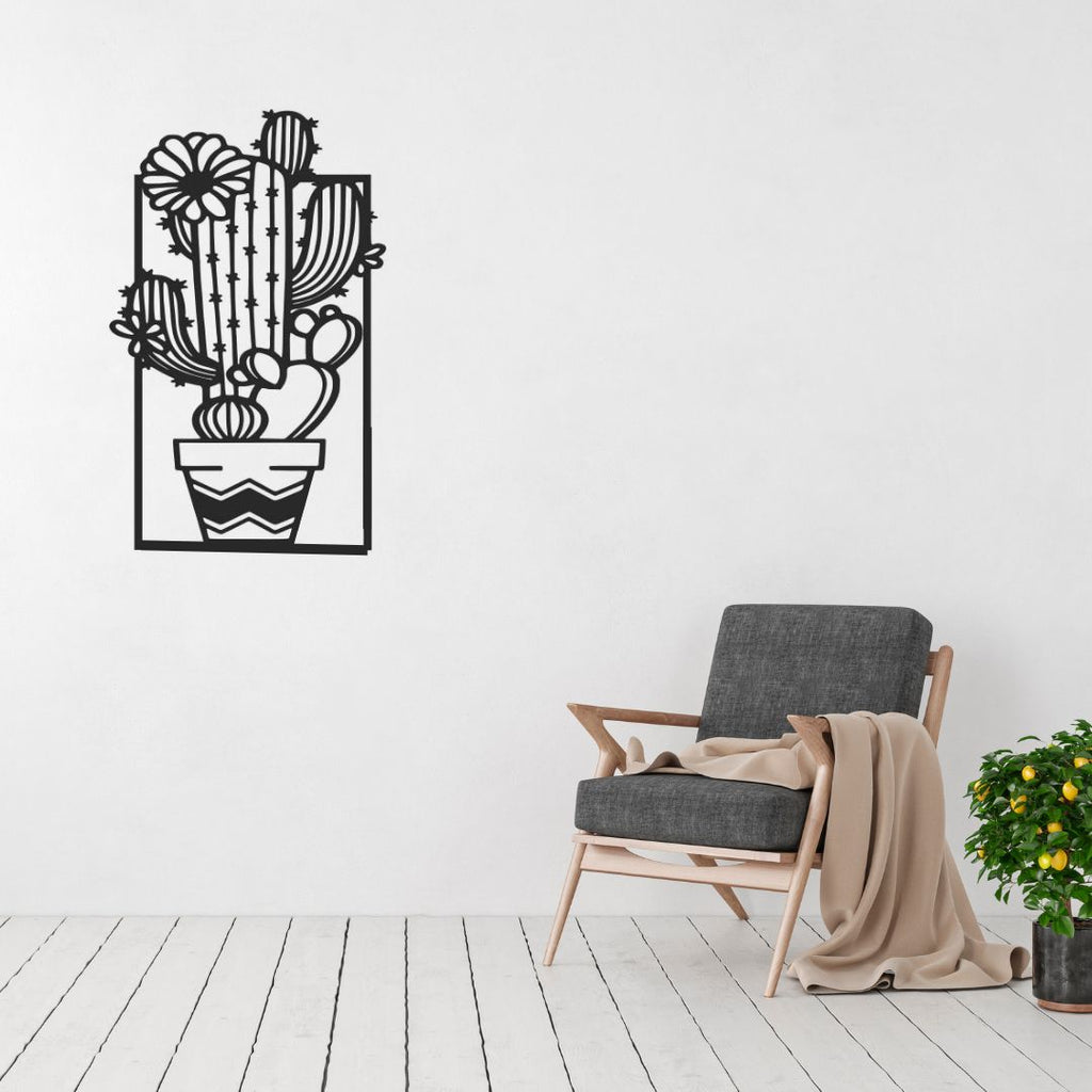 Cactus metal wall art displayed in a contemporary interior space