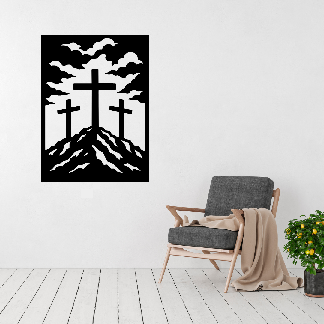 Calvary three crosses metal wall art displayed above a contemporary chair in a modern interior