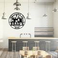 Home bar metal wall art displayed in a stylish entertainment area