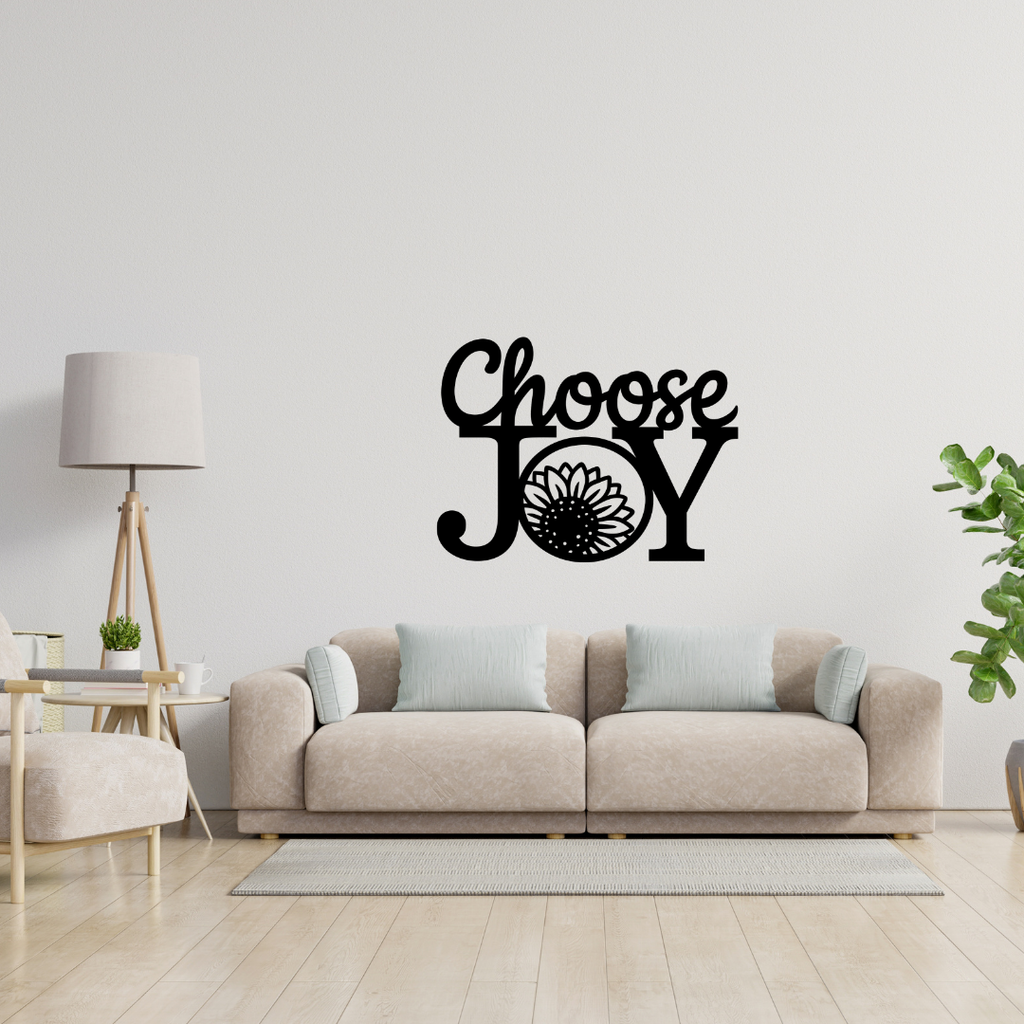 Choose Happiness | Choose Joy Metal Wall Sign showcased above a contemporary sofa in a bright living room.