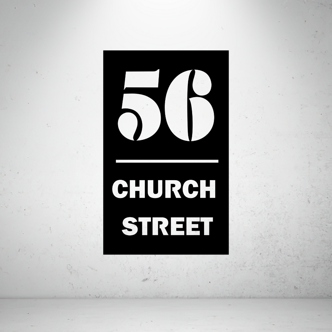 Modern metal address sign featuring a custom house number and street name separated by a minimalist horizontal divider.