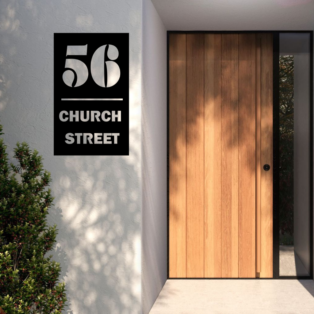 Church Street modern address sign installed on a contemporary rendered entrance wall beside a timber front door.