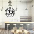 Cocktail-themed wall art displayed in a luxury home bar area