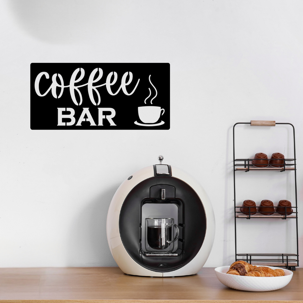 Coffee Bar Kitchen Metal Sign mounted above a home coffee machine in a contemporary coffee station.