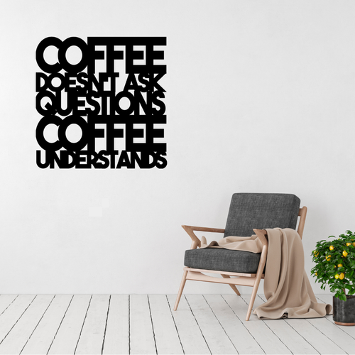Coffee Doesn't Ask Questions, Coffee Understands | Funny Coffee Metal Wall Art displayed in a modern living space above a contemporary accent chair.
