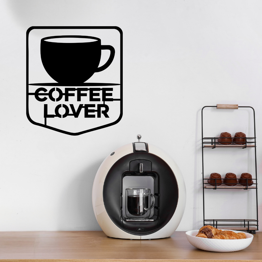 Coffee Lover Badge | Coffee Metal Wall Art showcased above a stylish home coffee station with an espresso machine and coffee accessories.