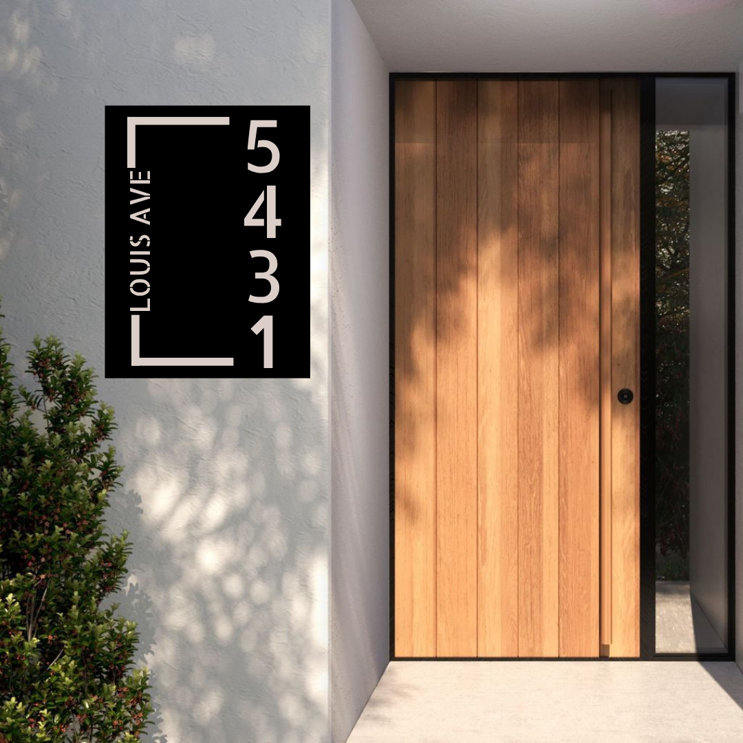 Metal house number corner address sign mounted at a contemporary home entrance