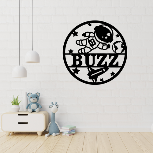 Space astronaut metal wall art displayed in a galaxy-themed kids bedroom