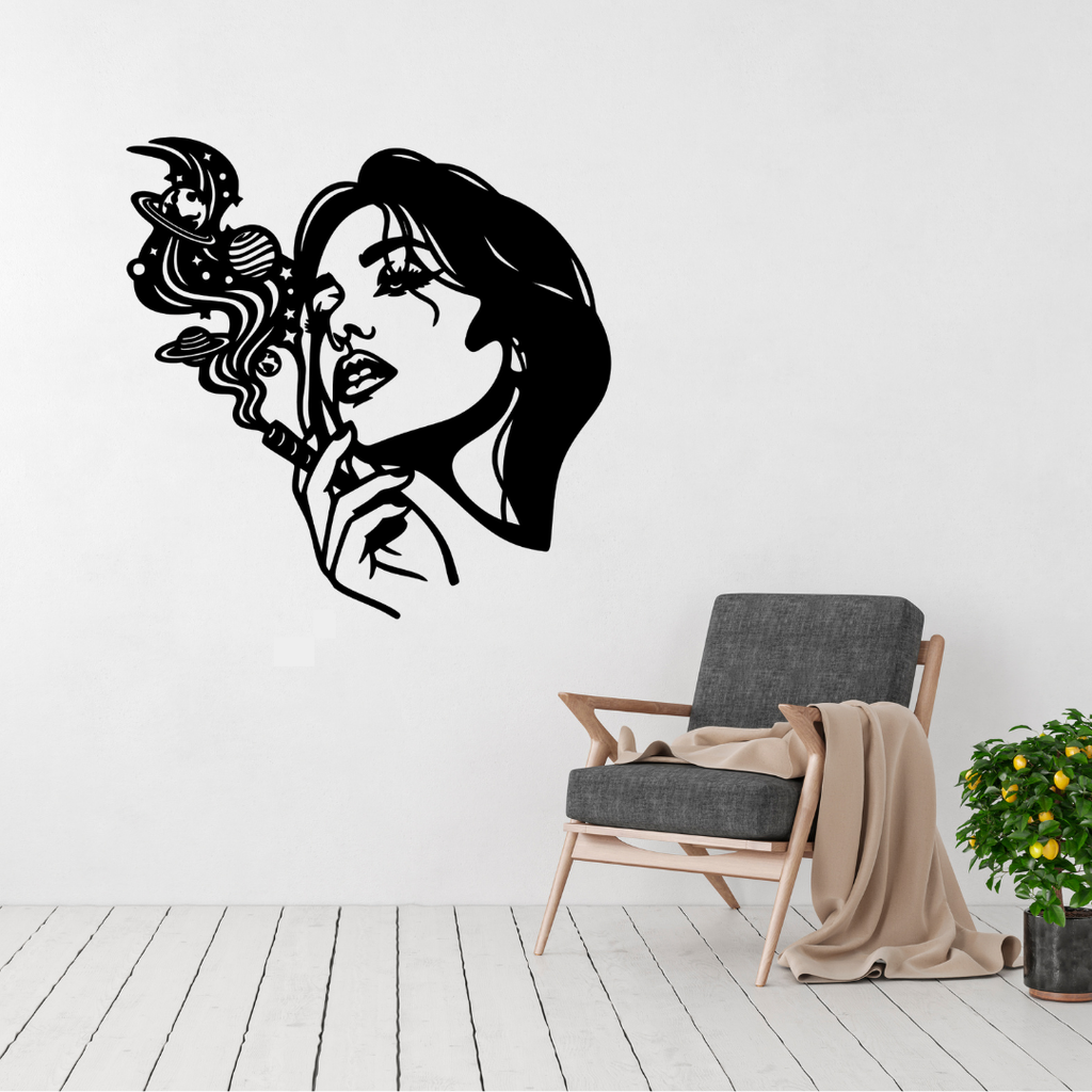 Cosmic Muse woman and universe metal wall art displayed above a contemporary chair