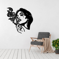 Cosmic Muse woman and universe metal wall art displayed above a contemporary chair