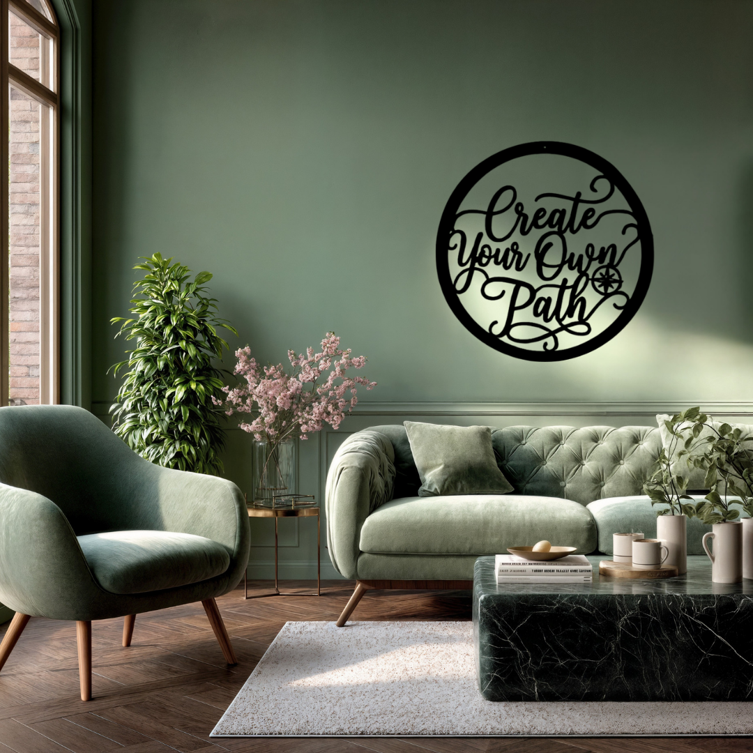 Create Your Own Path | Inspirational Metal Wall Art showcased in a contemporary lounge above a green sofa, adding motivational typography and modern circular metal décor to the living space.