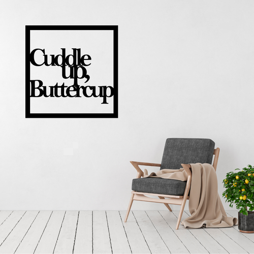 Cuddle Up Buttercup | Bedroom Quote Metal Wall Art displayed in a modern living space above a contemporary accent chair.