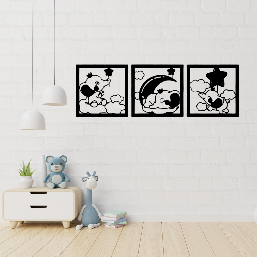 Dreamy Elephant Trio | Nursery Metal Wall Art Set displayed in a modern nursery, featuring three adorable elephant illustrations with clouds, stars, and a crescent moon in matching square black metal frames.