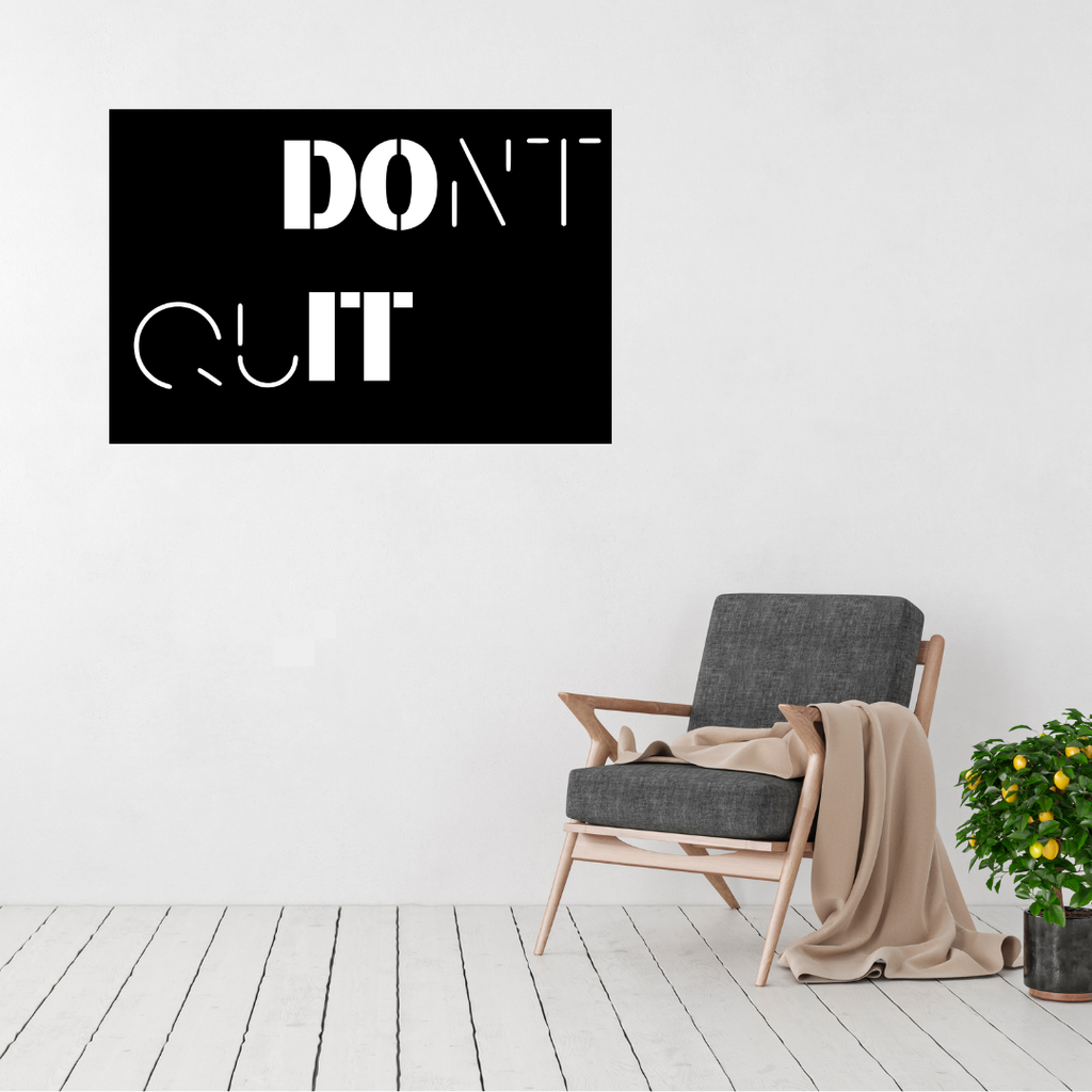 Resilience | Don't Quit Metal Wall Art displayed in a modern home gym beside a fitness training area.
