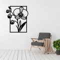Elegant Orchid | Orchid Flower Metal Wall Art displayed on a modern white wall above a contemporary armchair.