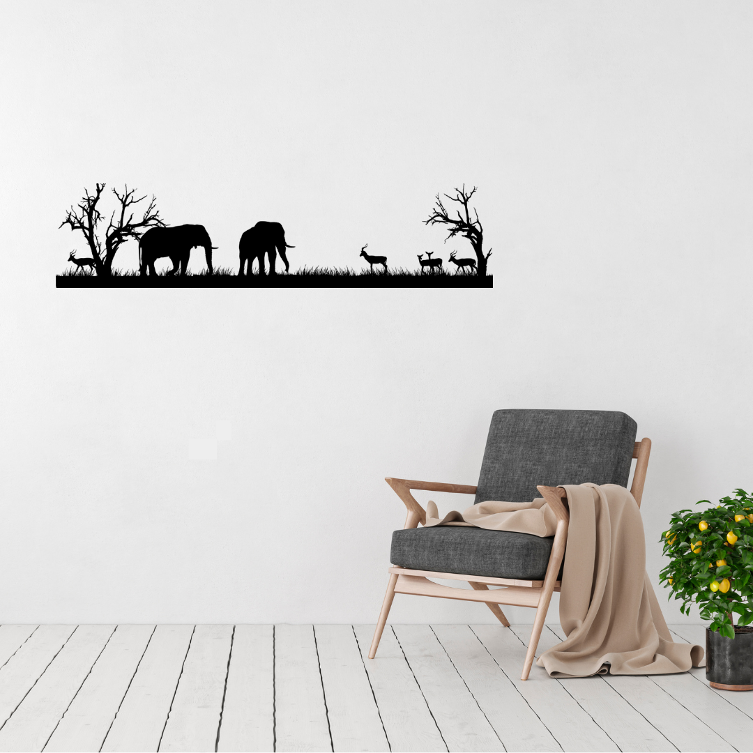 African savanna silhouette metal wall art featuring elephants, impala and bare African trees over contemporary chair.