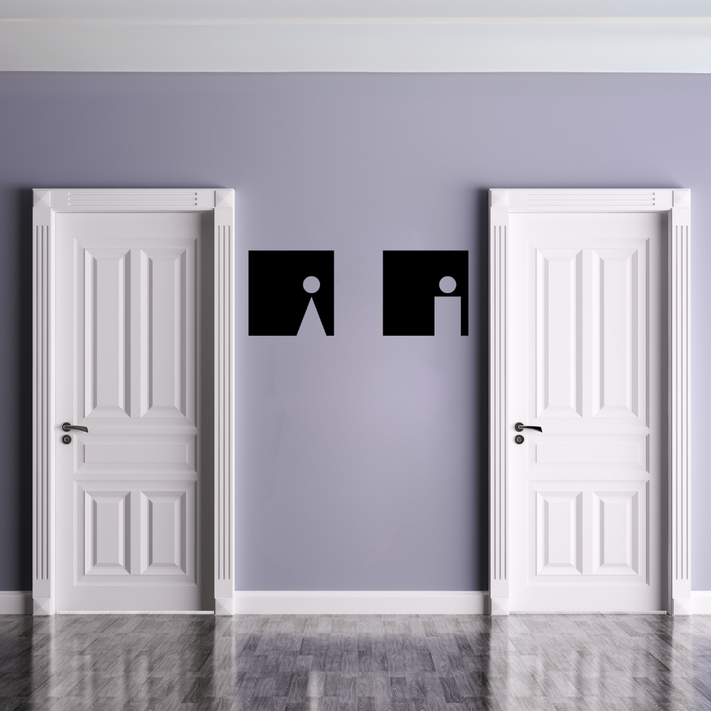 Essential Icons male and female toilet signs installed between restroom doors in a modern commercial interior.