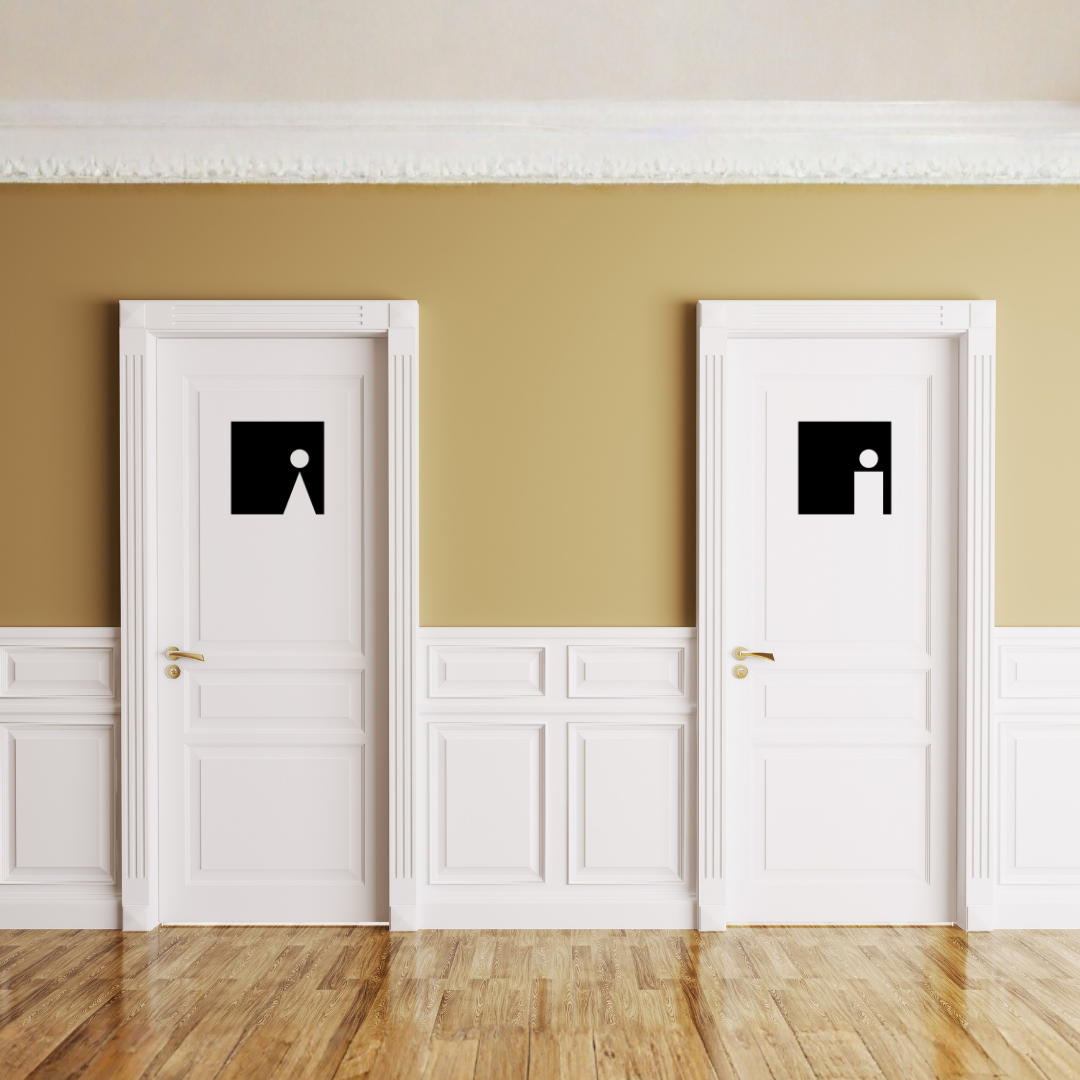 Essential Icons male and female toilet signs mounted on individual restroom doors in a contemporary commercial building.