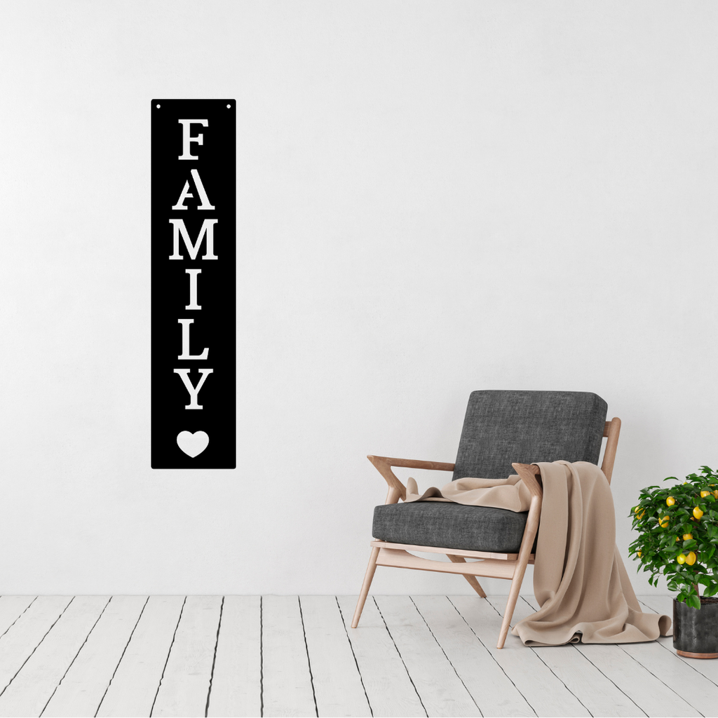 Family First | Vertical Family Metal Wall Sign displayed in a modern living room.