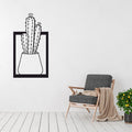 Metal cactus wall art displayed in a contemporary interior space