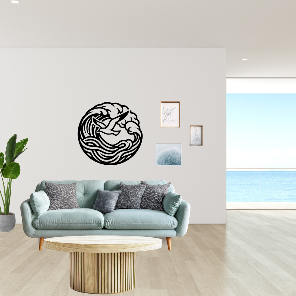 Freedom at Sea | Seagull Wave Metal Wall Art showcased on a contemporary feature wall, highlighting a graceful seagull soaring through powerful ocean waves in circular black metal, ideal for coastal décor, seaside homes and modern living spaces.