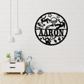 Astronaut metal wall art displayed in a galaxy-inspired bedroom
