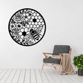 Garden Nectar honeybee and floral metal wall art displayed above a contemporary chair in a modern interior