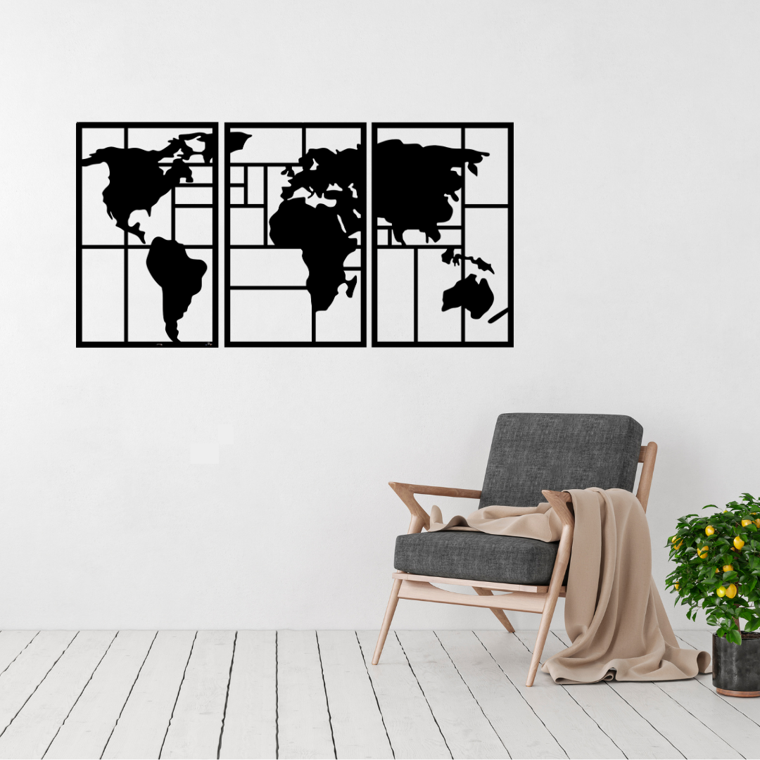 Global Horizons three-panel world map metal wall art displayed above a contemporary chair in a modern interior