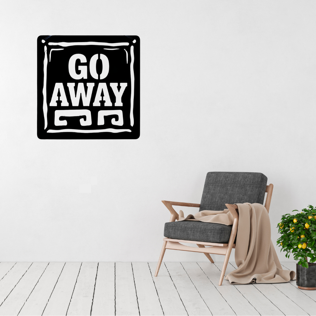 Go Away | Humorous Rustic Metal Wall Sign displayed in a bright modern living room, featuring bold vintage-inspired typography within a rustic square frame.