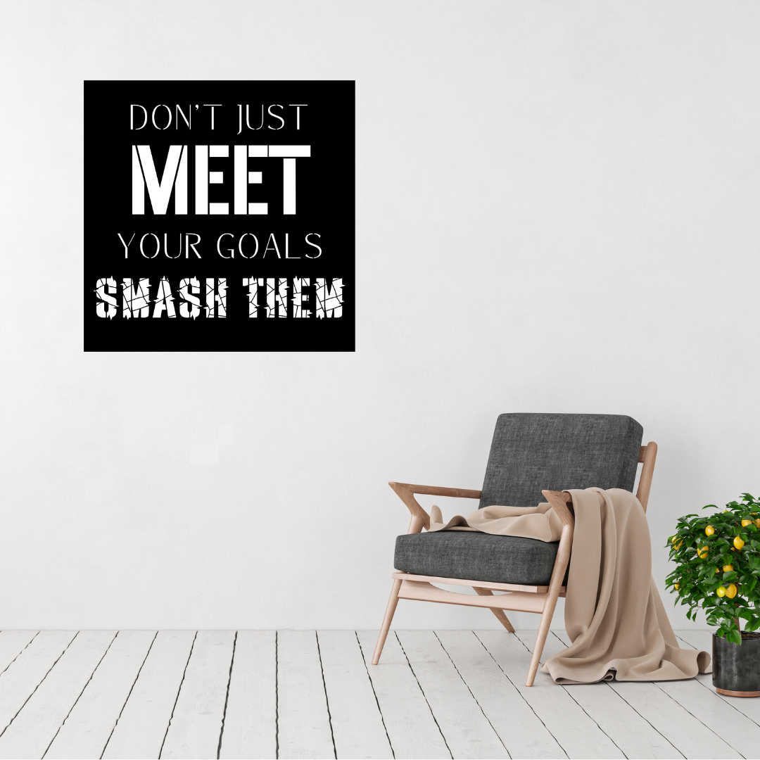 Goal Crusher | Don't Just Meet Your Goals Smash Them Metal Wall Art displayed in a modern living room.