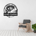 Gone Fishing rustic metal wall art featuring a bass fish inside a fishing rod frame displayed in a modern living room.