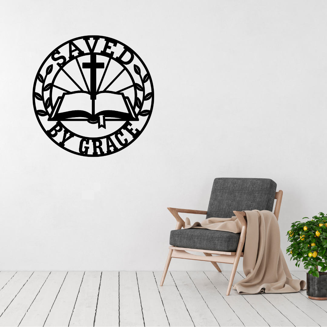 Grace and Redemption Saved by Grace metal wall art displayed above a contemporary chair in a modern interior