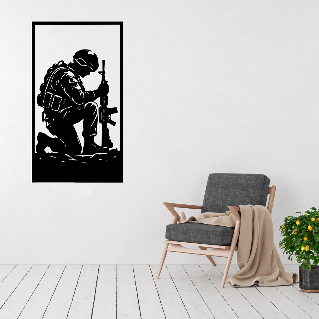 Guardian at Rest kneeling soldier metal wall art displayed above a contemporary chair in a stylish modern interior