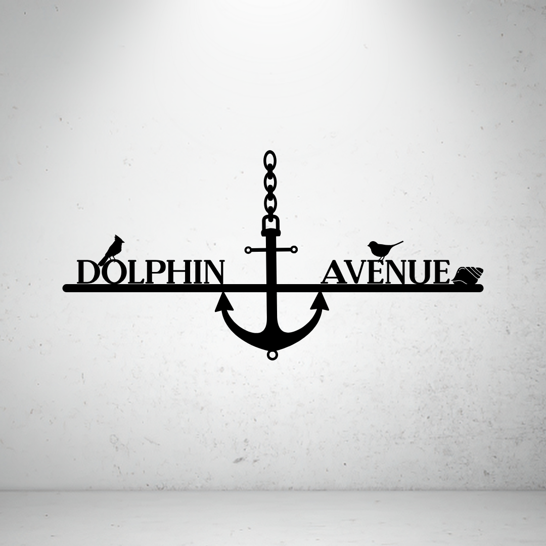Metal house number and street name sign with anchor detail on a grey background