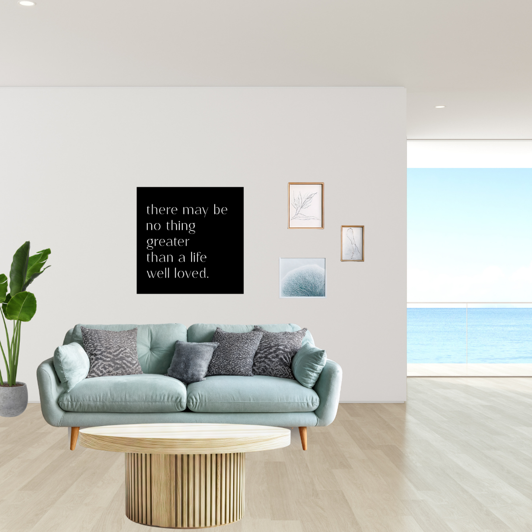 Heartfelt Inspiration | There May Be No Thing Greater Than a Life Well Loved Metal Wall Art showcased above a contemporary sofa in a bright modern living space.
