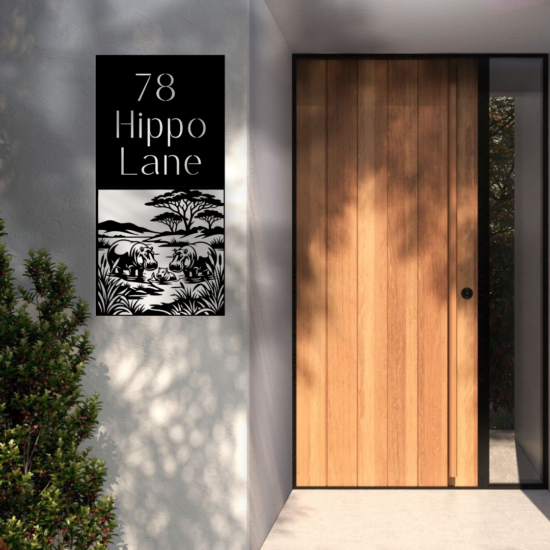 Hippo Lane safari vertical house number sign installed beside a modern timber front door.