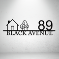 Metal house number sign with minimalist home and tree design on a grey background