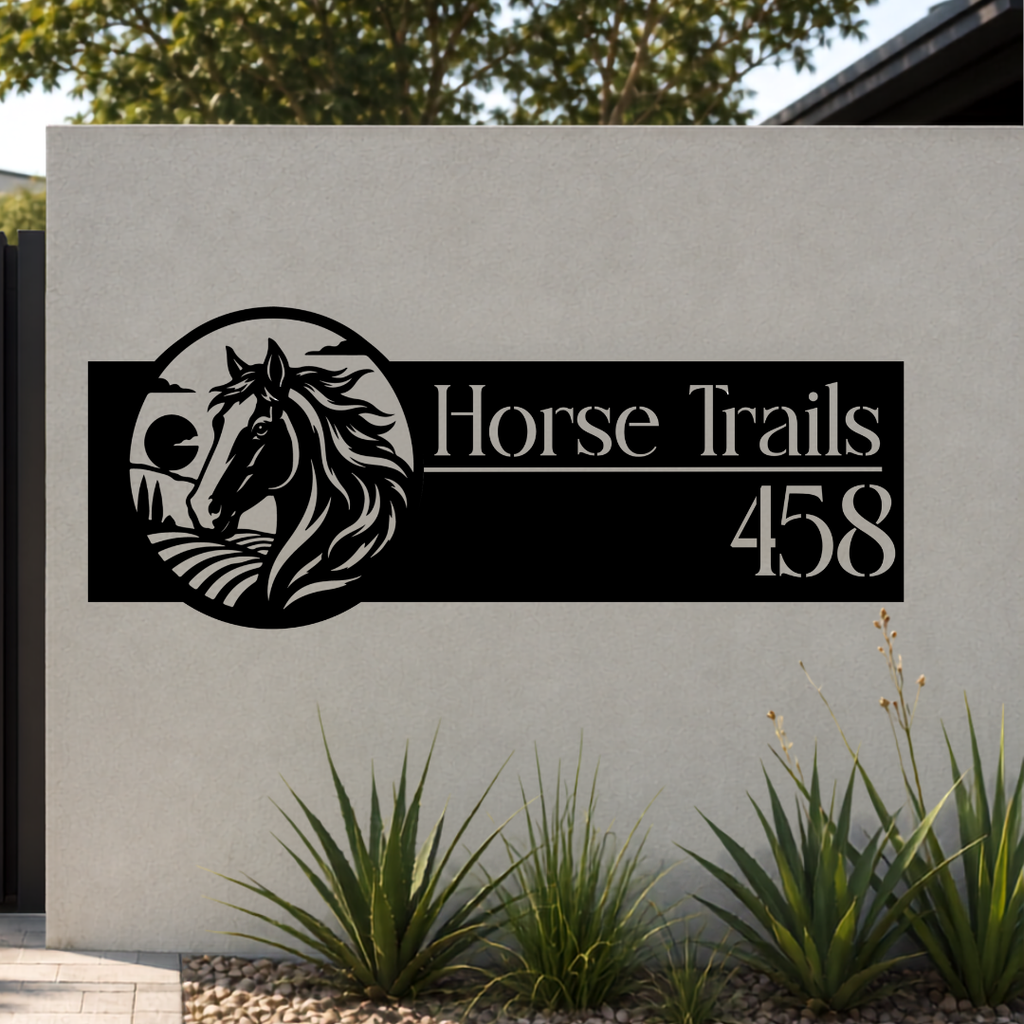 Horse Trails Running Horse custom metal house number sign mounted on a modern rendered boundary wall beside a black aluminium sliding gate.