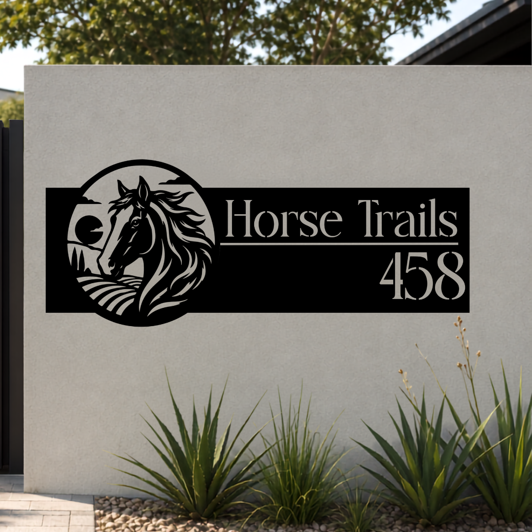 Horse Trails Running Horse custom metal house number sign mounted on a modern rendered boundary wall beside a black aluminium sliding gate.