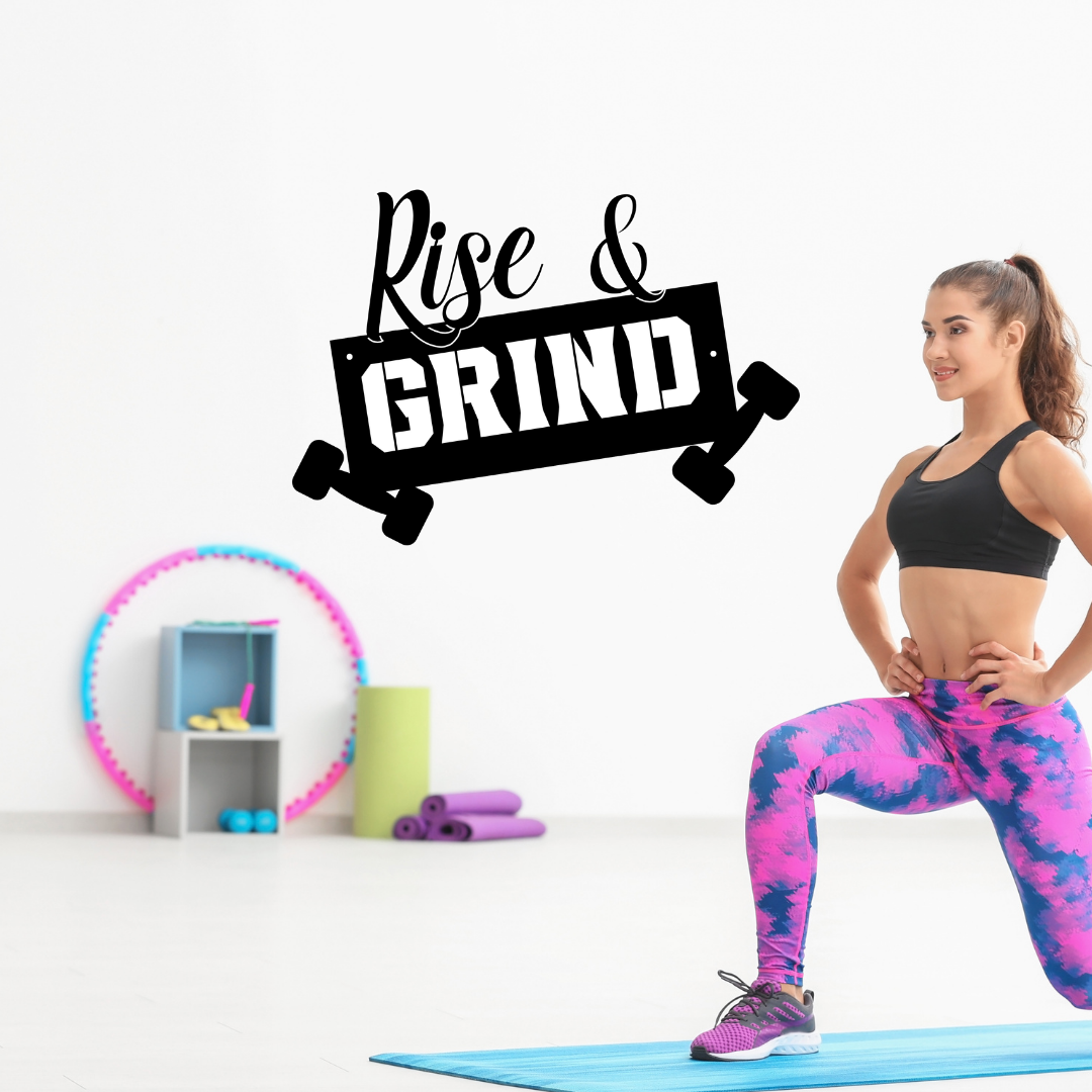 Hustle & Strength | Rise & Grind Metal Wall Art showcased in a bright home gym.