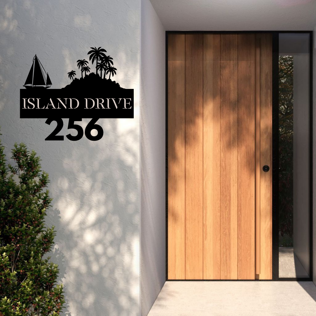 Metal house number island-inspired address sign installed at a beach house entrance