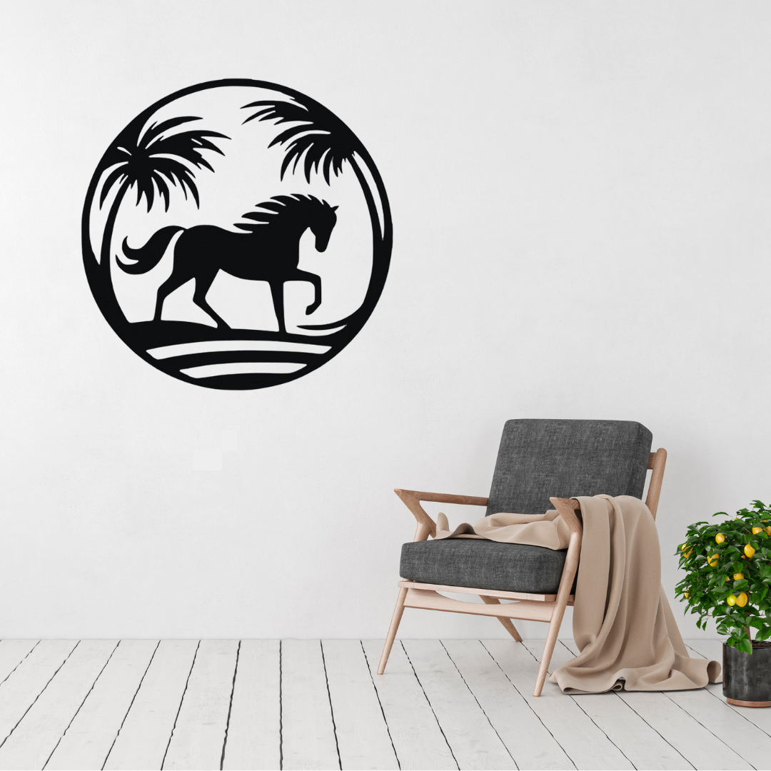 Island Stallion | Tropical Horse Metal Wall Art displayed above a modern grey accent chair, featuring a graceful horse silhouette framed by tropical palm trees in a circular black metal wall art design.