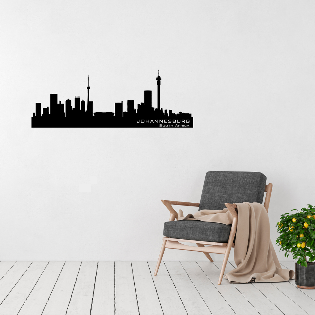 Johannesburg South Africa skyline metal wall art featuring the cityscape displayed above a contemporary chair
