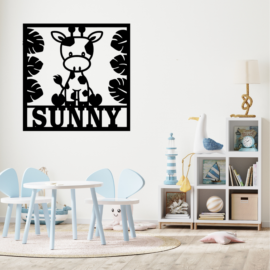Personalised giraffe wall décor styled with tropical nursery accessories